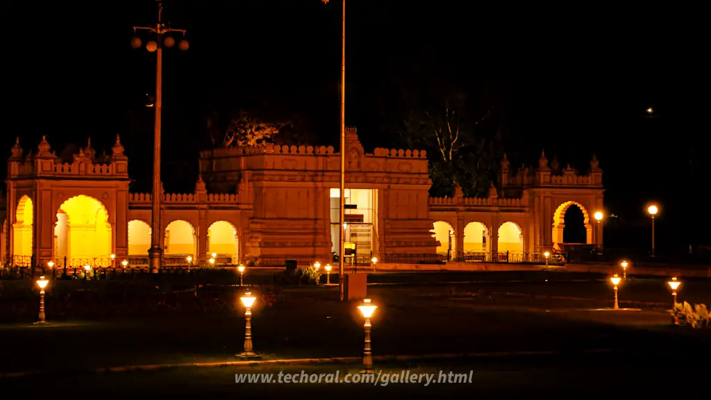 Captivating view of the illuminated Mysore Palace against the night sky, showcasing its enchanting beauty. The dazzling lights accentuate the architectural details, creating a mesmerizing sight. Experience the magical allure of Mysore Palace, a symbol of royal grandeur and cultural richness, in this breathtaking image